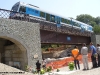 Il convoglio Stadler DEM4c 503 sul nuovo ponte che ha permesso la riapertura della tratta Madonna del PortoâSoveria Mannelli della linea FC CosenzaâCatanzaro. (San Pietro Apostolo; 04/08/2011; Roberto Galati / tuttoTreno)