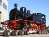La 240 05 delle Ferrovie Nord Milano, ora nel parco di Trenord, sul carrello stradale prima della partenza dallo stabilimento della Lucato Termica a Castelletto Monferrato. (10/08/2011; foto Lucato Termica / tuttoTreno)